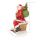 Weihnachtsmann-Figur im Retro-Design mit Geschenke-Sack beim Klettern in den Schornstein, mit goldenem Glitzerstaub